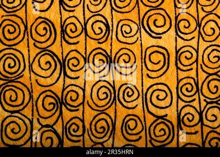 Nahtloses Muster mit Spiralen auf Gelb. Schwarze Spiralen und vertikale Linien auf Gelb. Und vertikale Linien auf Gelb. Stockfoto