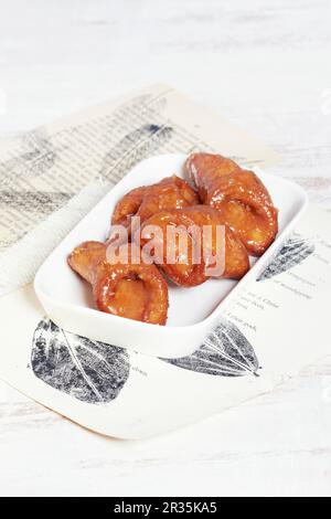 Pestions (frittiertes Gebäck mit Honigglasur, Spanien) Stockfoto