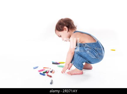 Babymädchen schreiben Stockfoto