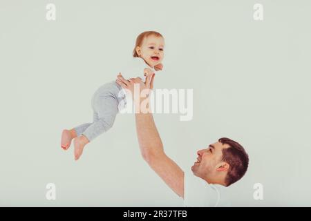 Papa und Baby Spaß Stockfoto