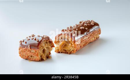 Ein Karamell-eclair Stockfoto