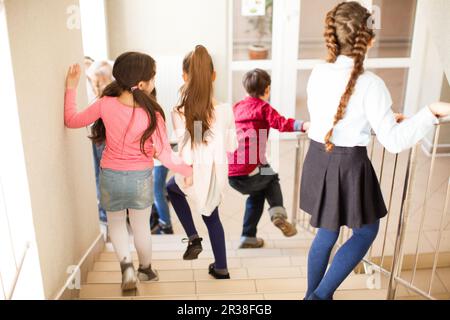 Schüler, die in der Pause sind Stockfoto