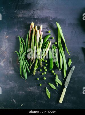 Grüne Bohnen Spargelerbsen und flache Bohnen Taccole Stockfoto