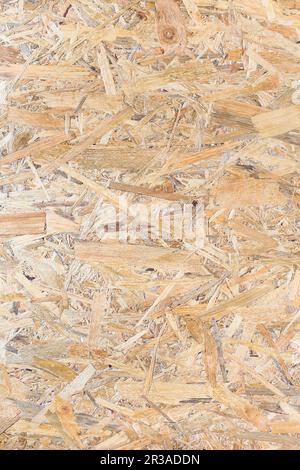 OSB-Panel-Struktur. Oriented Strand Board. Baumaterial aus Spanplatten. OSB-Holzplatte aus Pres Stockfoto