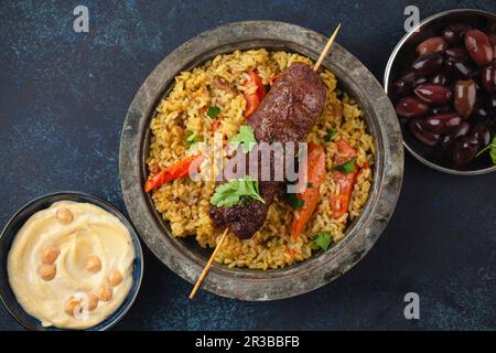 Traditionelles nahöstliches Fleischkebab mit Reis Stockfoto