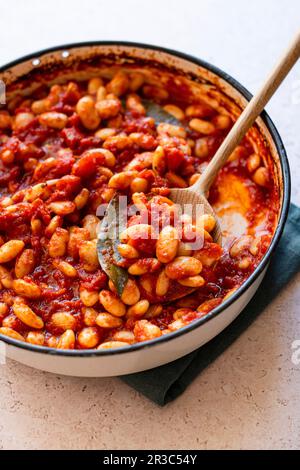 Südafrikanisches Heerenbone in Tomatensoße gebacken Stockfoto