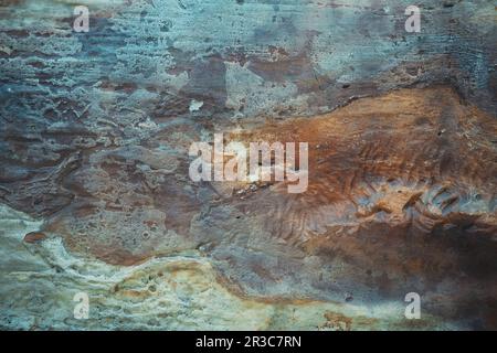 Marmoroberfläche mit blauer und brauner Färbung. Uralter Steinhintergrund. Stockfoto