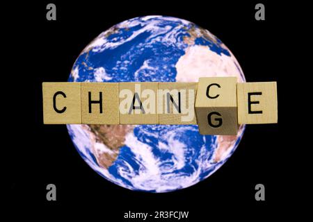 Zufall oder Veränderung, symbolisches Bild für die Chance oder die Veränderung auf der Erde Stockfoto