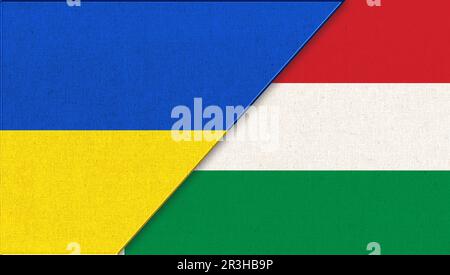 Flagge der Ukraine und Ungarns - Abbildung 3D. Zwei Flaggen Zusammen – Stoffstruktur. Nationale Symbole Stockfoto