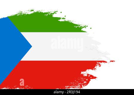 Äquatorialguinea-Flagge auf einem gefärbten Strichpinsel, isolierter weißer Hintergrund mit Kopierbereich Stockfoto