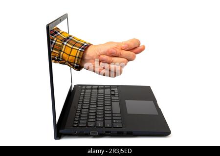 Die Hand zeigt eine Figur vom Computermonitor auf weißem Hintergrund Stockfoto