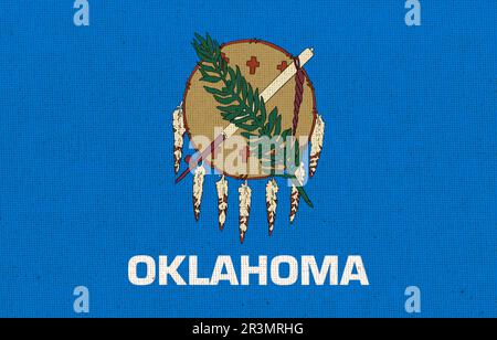 Flagge des amerikanischen Staates Oklahoma auf strukturierter Oberfläche. Flaggen der US-Bundesstaaten Fabric Flag Oklahoma. Symb Stockfoto