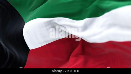 Aus nächster Nähe sehen Sie die Kuwait-Nationalflagge, die im Wind winkt Stockfoto