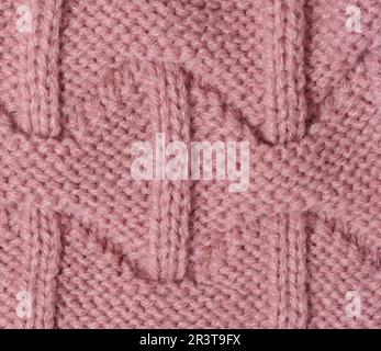 Struktur aus rosa Strickmaterial Stockfoto
