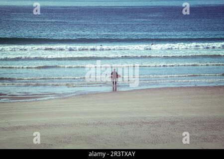 Surfen, Vazon Bay, Guernsey, Großbritannien Stockfoto