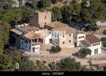 Castell de Sant Elm , Altes Krankenhaus und Verteidigungsturm aus dem 14. Jahrhundert, Sant Elm, andratx Küste, Mallorca, Balearen, Spanien. Stockfoto