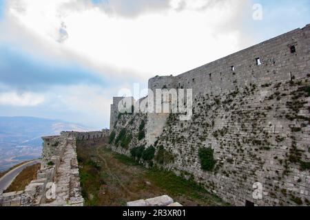 Krak (CRAC) des Chevaliers, auch bekannt als (Schloss der Kurden) und früher CRAC de l'Ospital, ist eine Kreuzritter-Burg in Syrien und eine der imponiertesten Stockfoto