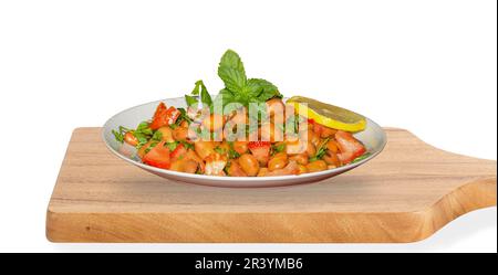 Fava-Bohnen-Salat mit Tomaten, Petersilie, Zitrone und Minze Stockfoto
