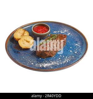 Gegrilltes Steak mit Kartoffeln auf einem Teller, isoliert auf Weiß. Foto für das Menü Stockfoto