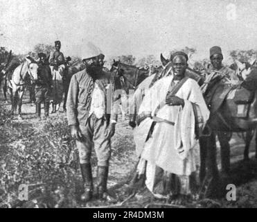 "En Afrique, La conquete du Cameroun; Le capitaine Godard, des spahis, tue Devant Garour, A Yamboutou, le 13 fevrier, et le sultanBokhar, des Mandaras', 1915 (1924). Aus „L'Album de la Guerre 1914-1919, Volume I“ [L'Illustration, Paris, 1924]. Stockfoto