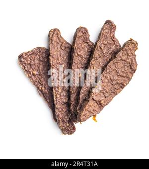 Trockenfleisch für Hunde. Kaugummi für Hunde, isoliert auf weißem Hintergrund. Stockfoto