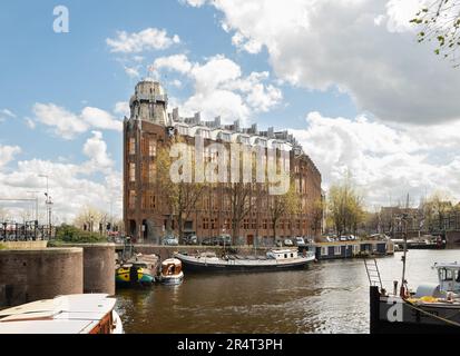 Amsterdam, Niederlande - Het Scheepvaarthuis Versandbüros (jetzt Grand Hotel Amrath) von JM van der May mit Michel de Klerk und Pier Kramer Stockfoto