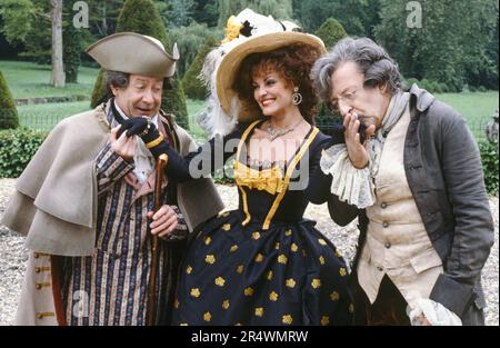 Pierre Olaf, Catherine Rouvel und Henri Virlojeux am Drehort des Fernsehfilms "Le serin du Major", Regie Alain Boudet 1982. Stockfoto