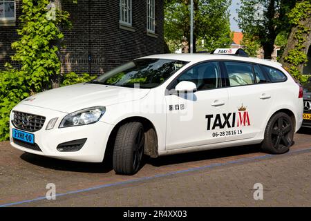 TAXIMA Personenvervoer Volvo V60 Stockfoto