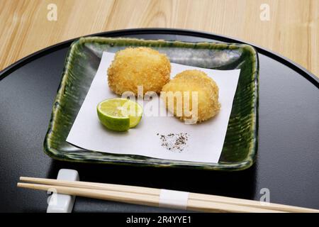 Gebratene Fischmilchpulver, traditionelle japanische Küche Stockfoto