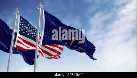 Indiana Staatsflagge, die an klaren Tagen mit der Nationalflagge der Vereinigten Staaten von Amerika wedelt. Rendern der 3D-Darstellung. Flatternder Stoff. Stockfoto