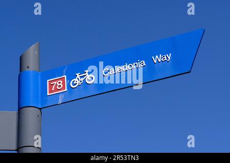 Schild für Caledonia Way-Fahrradroute, Oban, Schottland Stockfoto