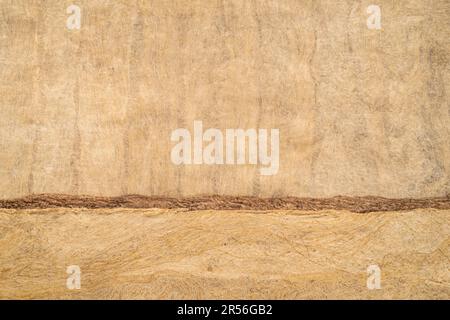 Abstrakte Landschaft - Hintergrund von handgemachtem Buchenlederpapier aus amate-Rinde in Mexiko Stockfoto