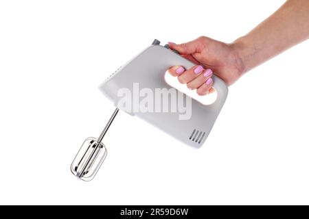 Weißer Küchenmischer in weiblicher Hand isoliert auf weißem Hintergrund Stockfoto