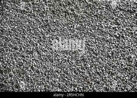 Textur von feinem grauen Kies, der zur Betonherstellung verwendet wird Stockfoto