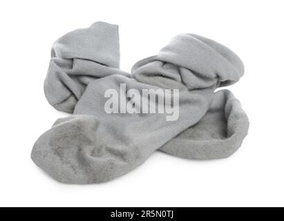 Ein Paar schmutzige Socken auf weißem Hintergrund Stockfoto
