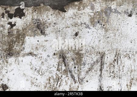 Schmutzige Wandstruktur. Grunge-Beton-Textur. Risse und Späne an der Wand... Stockfoto