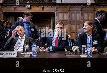 DEN HAAG - Alexander Shulgin (russischer Botschafter in den Niederlanden), Gennady Kuzmin (Botschafter im Großen, Außenministerium Russlands) und Maria Zabolotskaya (Stellvertretende Ständige Vertreterin der Russischen Föderation bei den Vereinten Nationen) Nehmen Sie ihren Platz im Internationalen Gerichtshof während einer öffentlichen Anhörung in einem Fall ein, den die Ukraine 2017 gegen Russland wegen der Besetzung der Ostukraine und der Krim eingereicht hat. Die Ukraine legt ihren Standpunkt dar. ANP REMKO DE WAAL niederlande raus - belgien raus Stockfoto