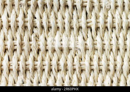 Korbstroh mit texturiertem Hintergrund, Nahaufnahme Stockfoto