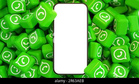 3D-Darstellung eines Mobiltelefons mit leerem Bildschirm auf dem Stapel WhatsApp-Logos. Stockfoto