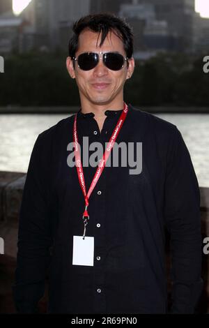 Sydneys jährliches Open-Air-Kino, wunderschön am Ufer des Hafens von Sydney gelegen, beginnt die Saison 2011 mit der Sydneys Premiere von „Burlesque“ mit Cher und Christina Aguilera Sydney, Australien - 12.01.11 Stockfoto