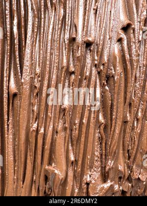 Nahaufnahme von Eiscreme mit Schokoladengeschmack. Konsistenz von Schokoladeneis Stockfoto