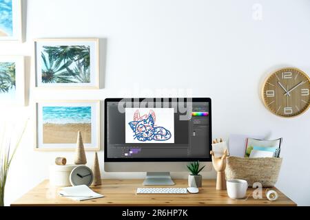 Arbeitsplatz des Animators. Moderner Computer mit Illustration auf dem Bildschirm Stockfoto