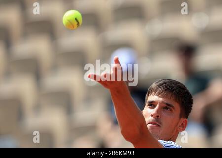 Bolivia's Juan Carlos Prado Angelo serves against Croatia's Dino
