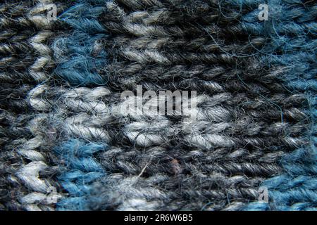 Jacke aus Wollgewebe in dunklen Farben Stockfoto