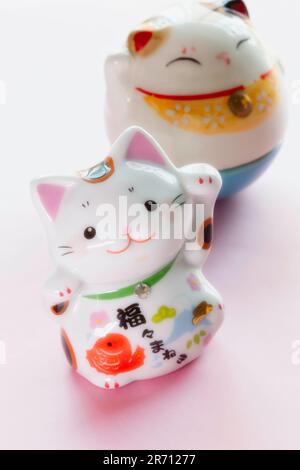 Maneki Neko, Glückskatzen-Figuren Stockfoto