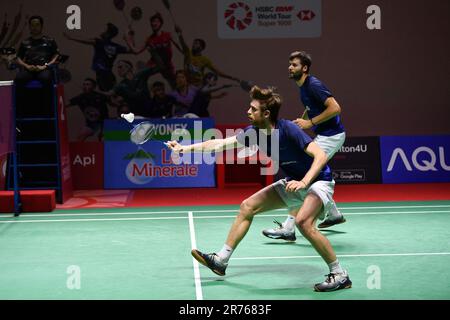 Jakarta, Indonesien. 13. Juni 2023. Lucas Corvee (L)/Ronan Labar treten bei der Indonesia Open 2023 in Jakarta, Indonesien, am 13. Juni 2023 in der ersten Runde der Männer-Doppel gegen Chinas He Jiting/Zhou Haodong an. Kredit: Xu Qin/Xinhua/Alamy Live News Stockfoto