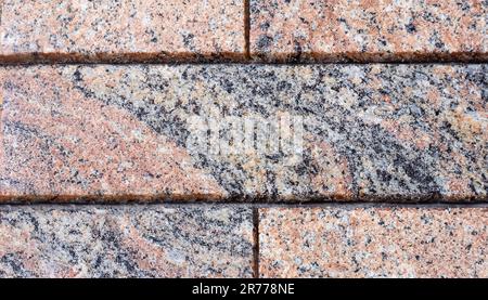 Granitstruktur, Granithintergrund, Granitstein Stockfoto