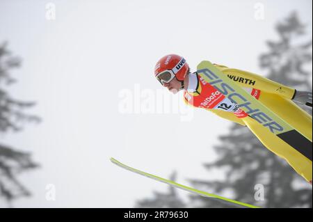 Michael Uhrmann Aktion Skispringen Welt Cup Teamspringen in Willingen 7,2.2010. Stockfoto