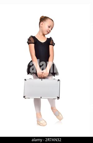 Ballerina in schwarzem Tutu mit Gehäuse auf weißem Hintergrund Stockfoto