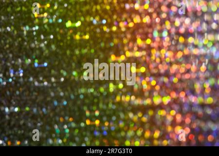 Abstrakter, verschwommener, farbenfroher Hintergrund. Weihnachtstapete. Glitzernde mehrfarbige Lichter. Bokeh-Hintergrund. Abstraktes mehrfarbiges Licht. Stockfoto